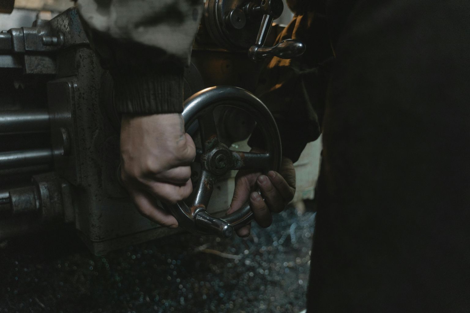 Person Holding Black and Silver Car Steering Wheel