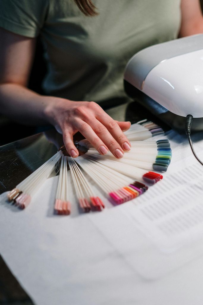 Person Holding White Printer Paper